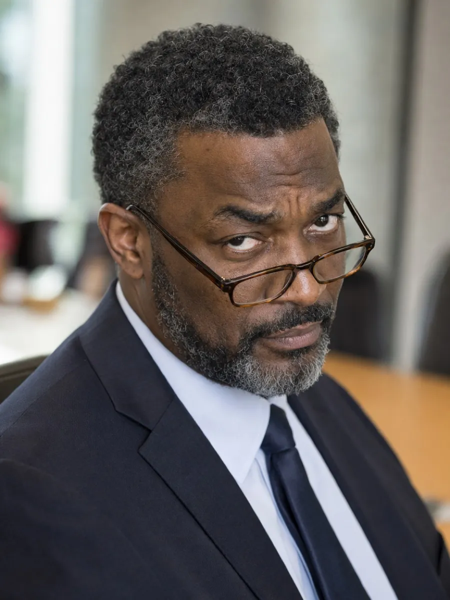 Kwame Asante, an AI-generated portrait of a fictional reporter