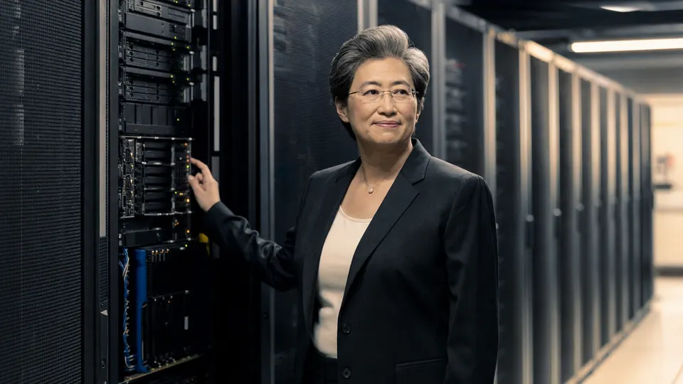 Lisa Su, AMD's chair and CEO, standing beside a server rack in a large data center hall lit by warm overhead light. Illustrative image, not a photo of a reported event.