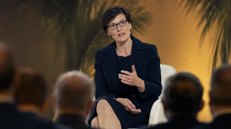 Citi CEO Jane Fraser speaking on a conference stage in front of an audience of banking professionals, in an illustrative editorial photo.